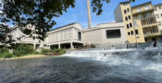 Photo of one of the many waterfalls built into the river to harness the power of the water for the textile industry.