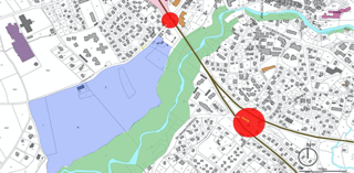 Vue cadastrale situant la zone de projet en bleu et les points d'intérêts du site dans les autres couleurs.